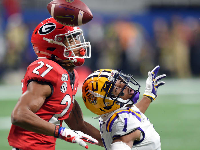 Georgia Bulldogs defensive back Eric Stokes (27) breaks up a pass intended for LSU Tigers wide receiver Ja'Marr Chase (1) during the first quarter of the the 2019 SEC Championship Game